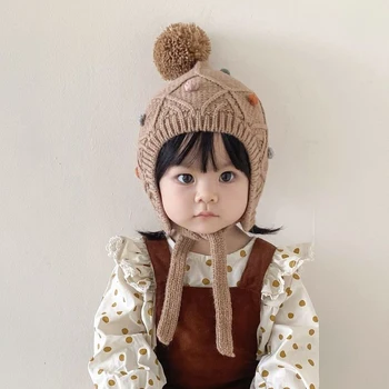 корейски зимни момиче бебе сладък hairball антифони топло плетени капачка бебе деца карирана плета случайни шапка бебе памук шнур капачки